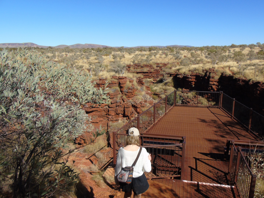 Walking to Oxer lookout Karijini National Park Walking towards Oxer Lookout, one of the most iconic viewpoints in Karijini National Park, Western Australia.